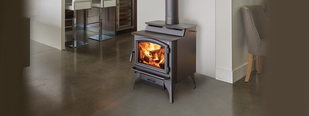 Lopi Endeavor wood stove in a furnished living room
